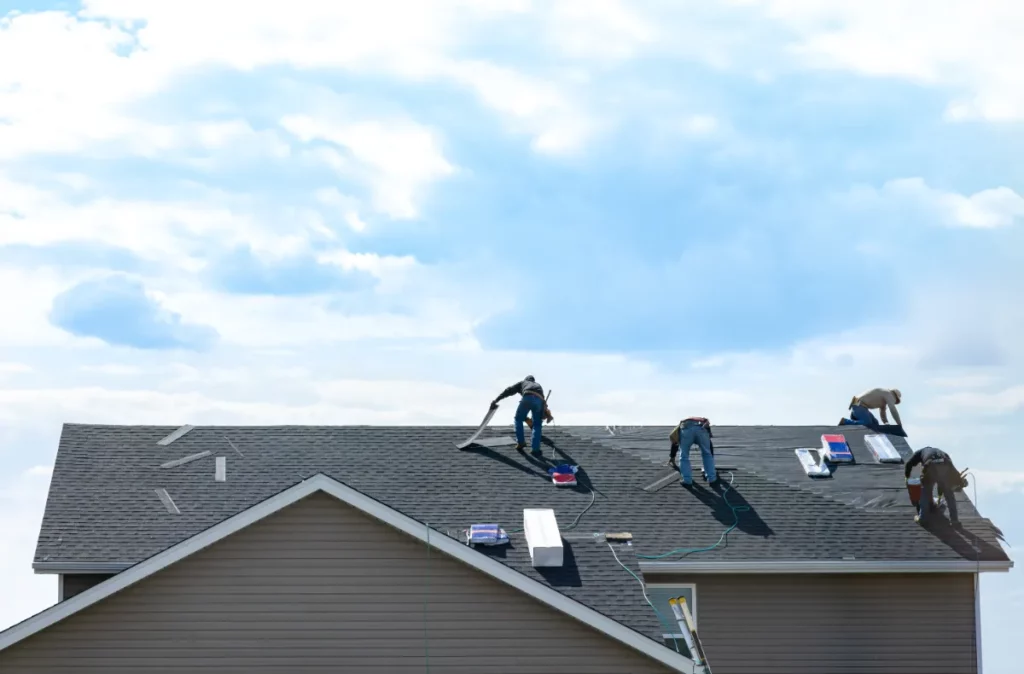 How do roof replacement companies handle cleanup and waste disposal?